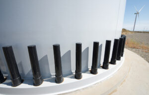 Close-up of the base of a wind turbine for electric power production.