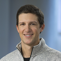 Headshot of AJ Emanuel