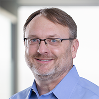 Headshot of Aaron Grosser